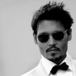 These Clubmaster inspired shades never go out of style and tend to look good on most everyone. Mr. Depp makes it work. Well, he makes most everything work including dreadlocks.